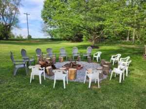 chairs around a campfire